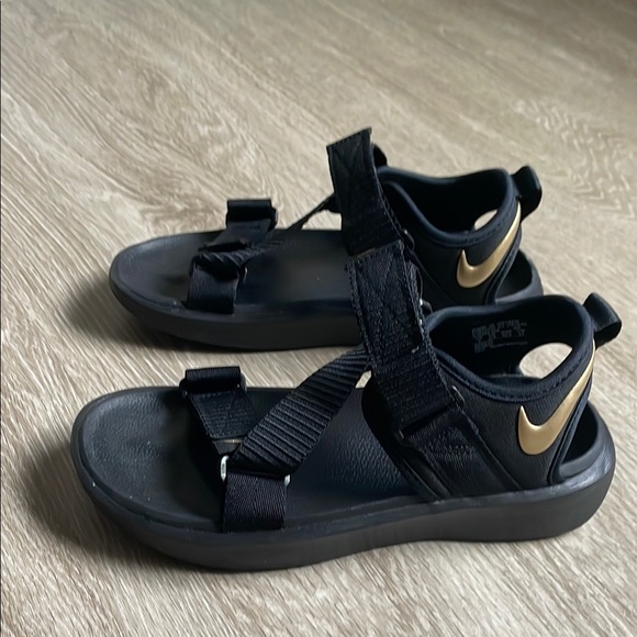 nike black and gold sandals